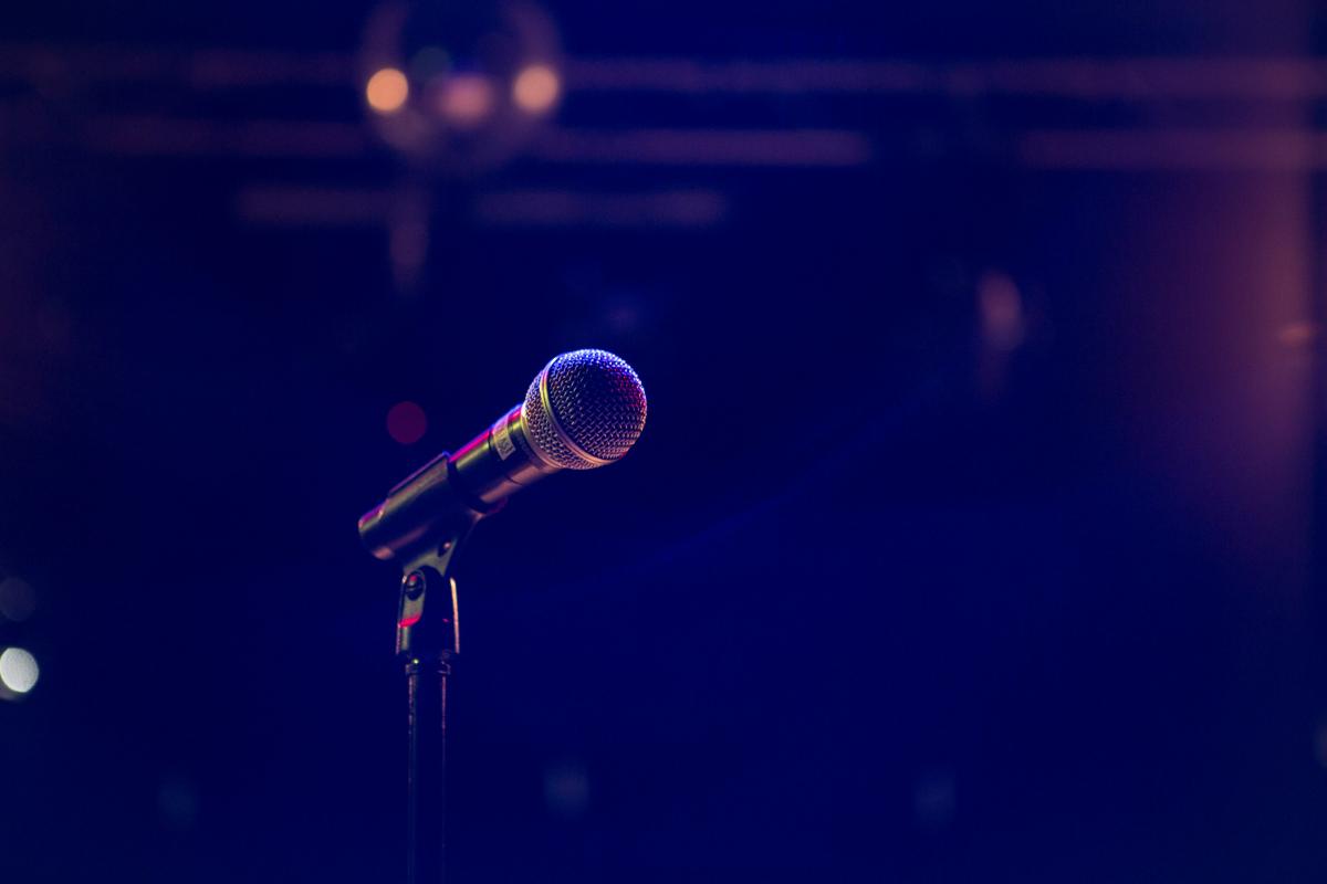 Microphone with a dark room as a background